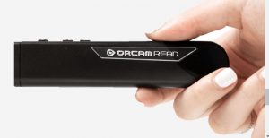 OrCam Read being held horizontally